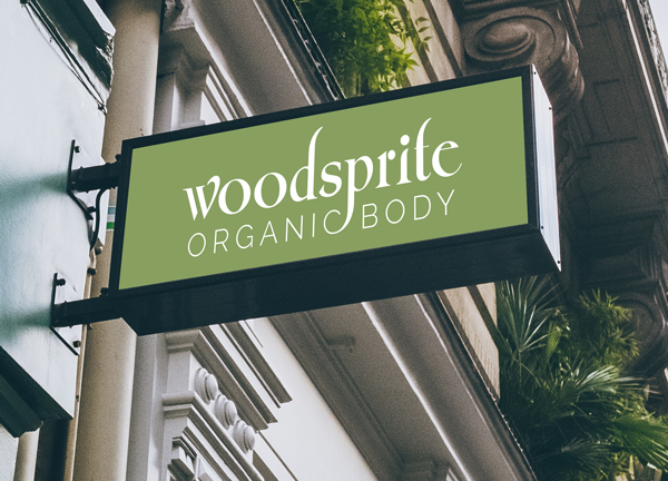 Woodsprite Organic Body sign on building